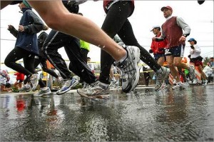 The added burden of wet sneakers and heavy clothes. (Globe-Staff/JohnTlumacki)